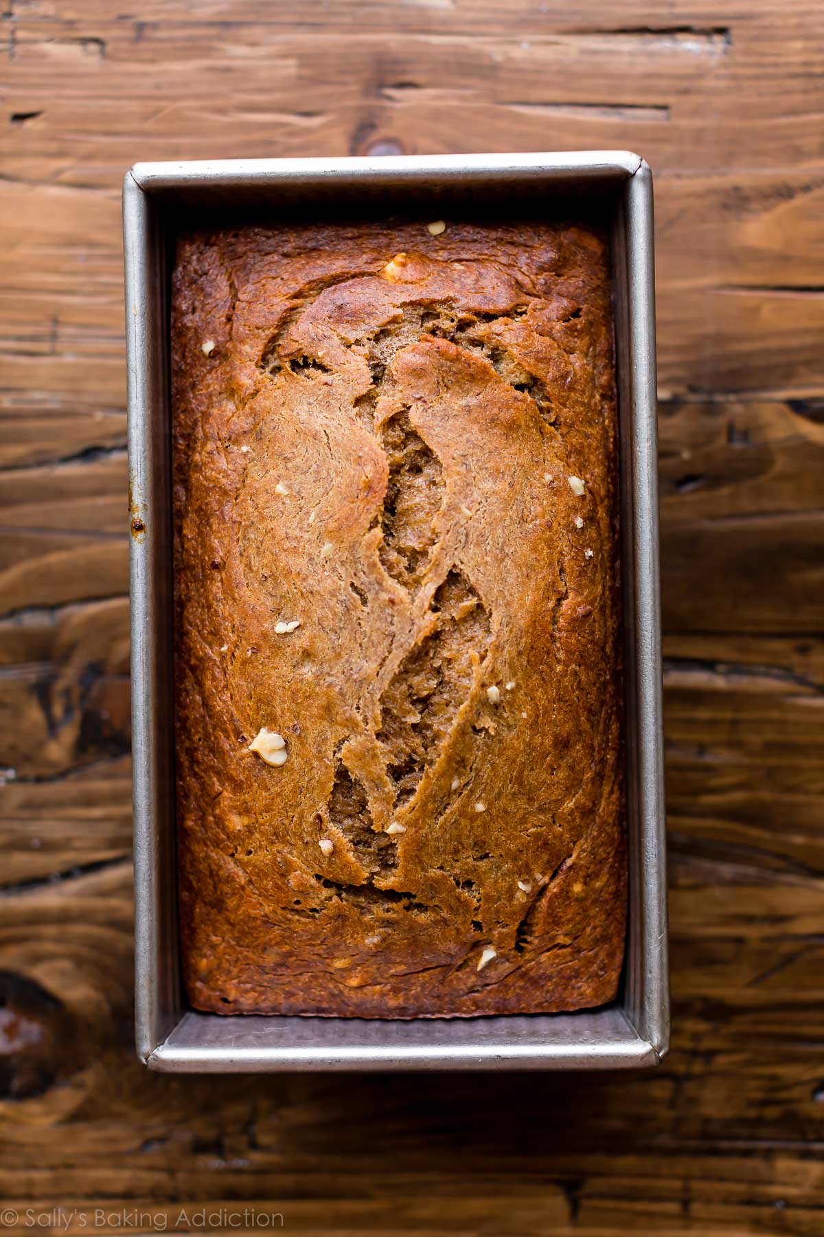 Moist, soft, and buttery banana bread, the only banana bread recipe you need! Best easy banana bread recipe on sallysbakingaddiction.com