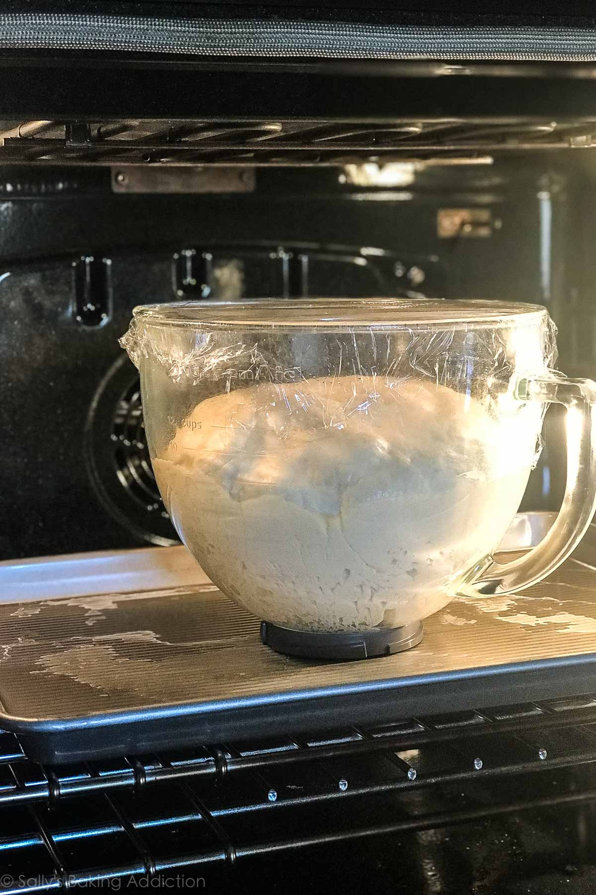 Bread dough rising on sallysbakingaddiction.com