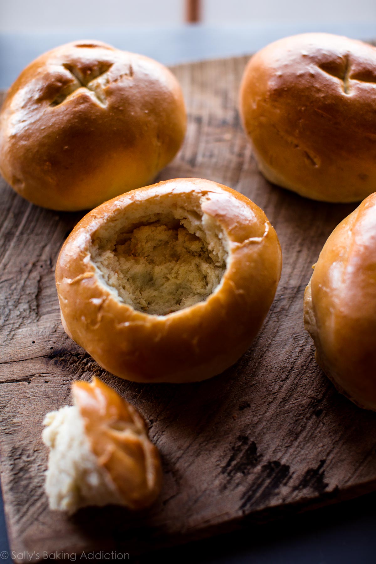 How to make crusty and soft homemade bread bowls with step by step pictures. This is a delicious basic dinner roll recipe you should hold onto! Recipe on sallysbakingaddiction.com